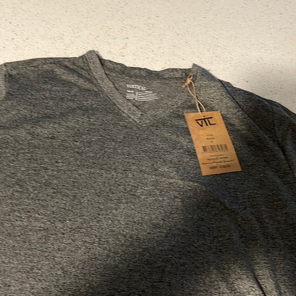 Men size  Medium new with tags. V neck